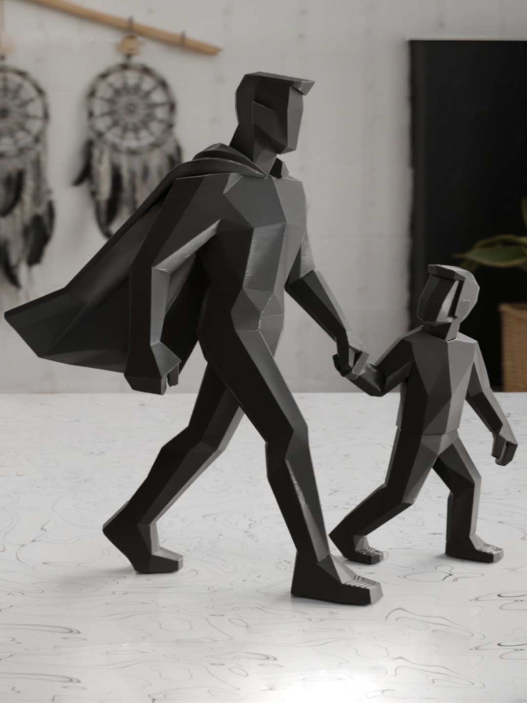 Figura decorativa padre e hijo